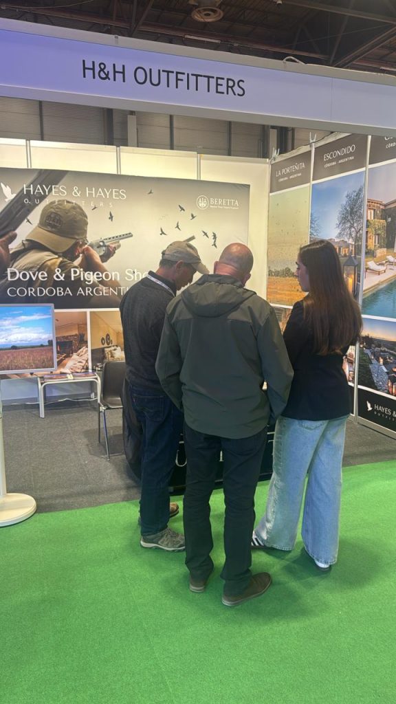 Visitors gathering information at a stand during Cinegética Madrid 2026