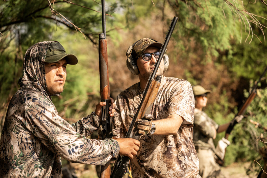 Hunters participating in a dove hunting excursion in Córdoba, Argentina.